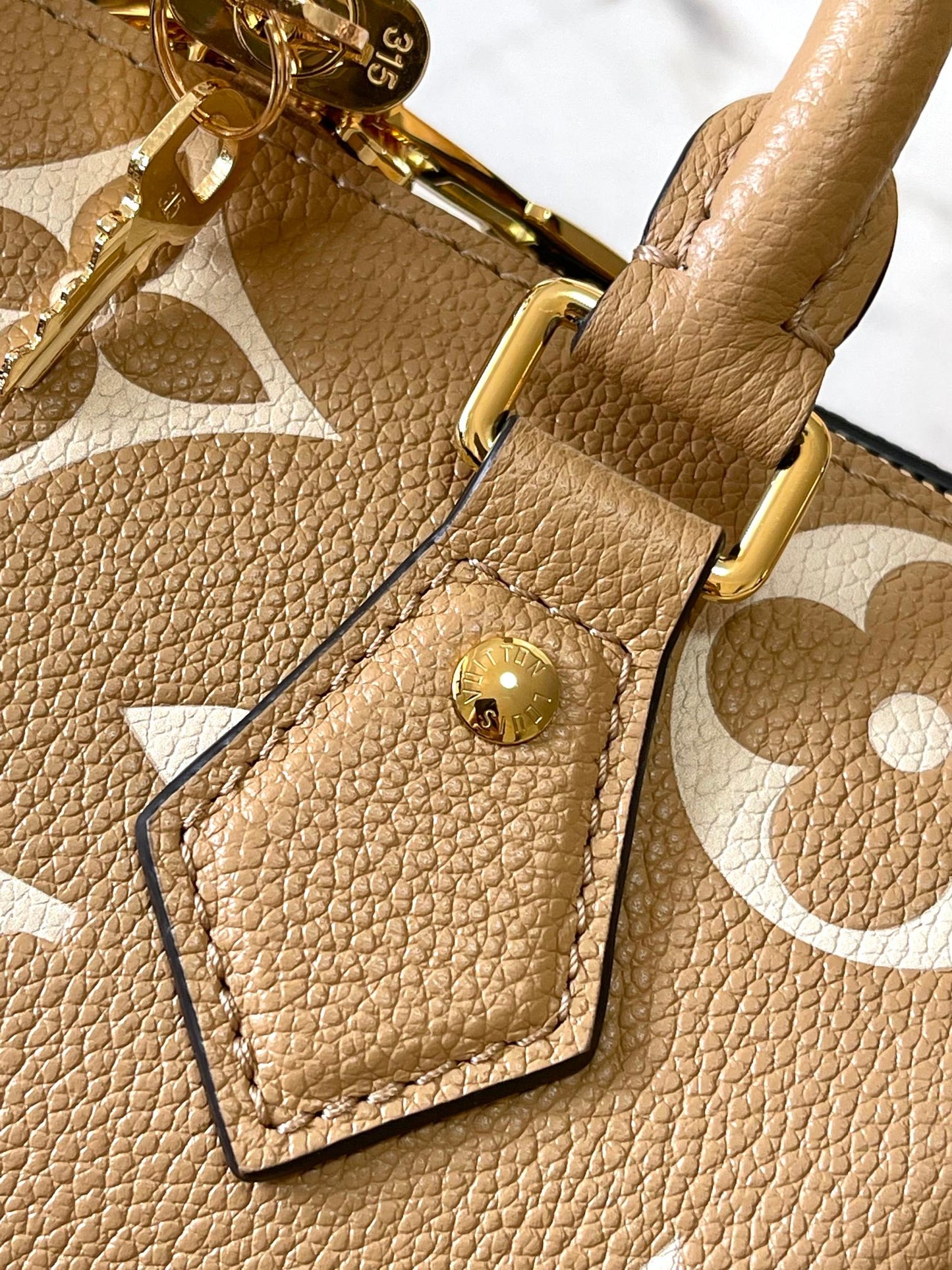 SPEEDY BANDOULI¨¨RE 20 IN MILK TEA MONOGRAM EMPREINTE LEATHER