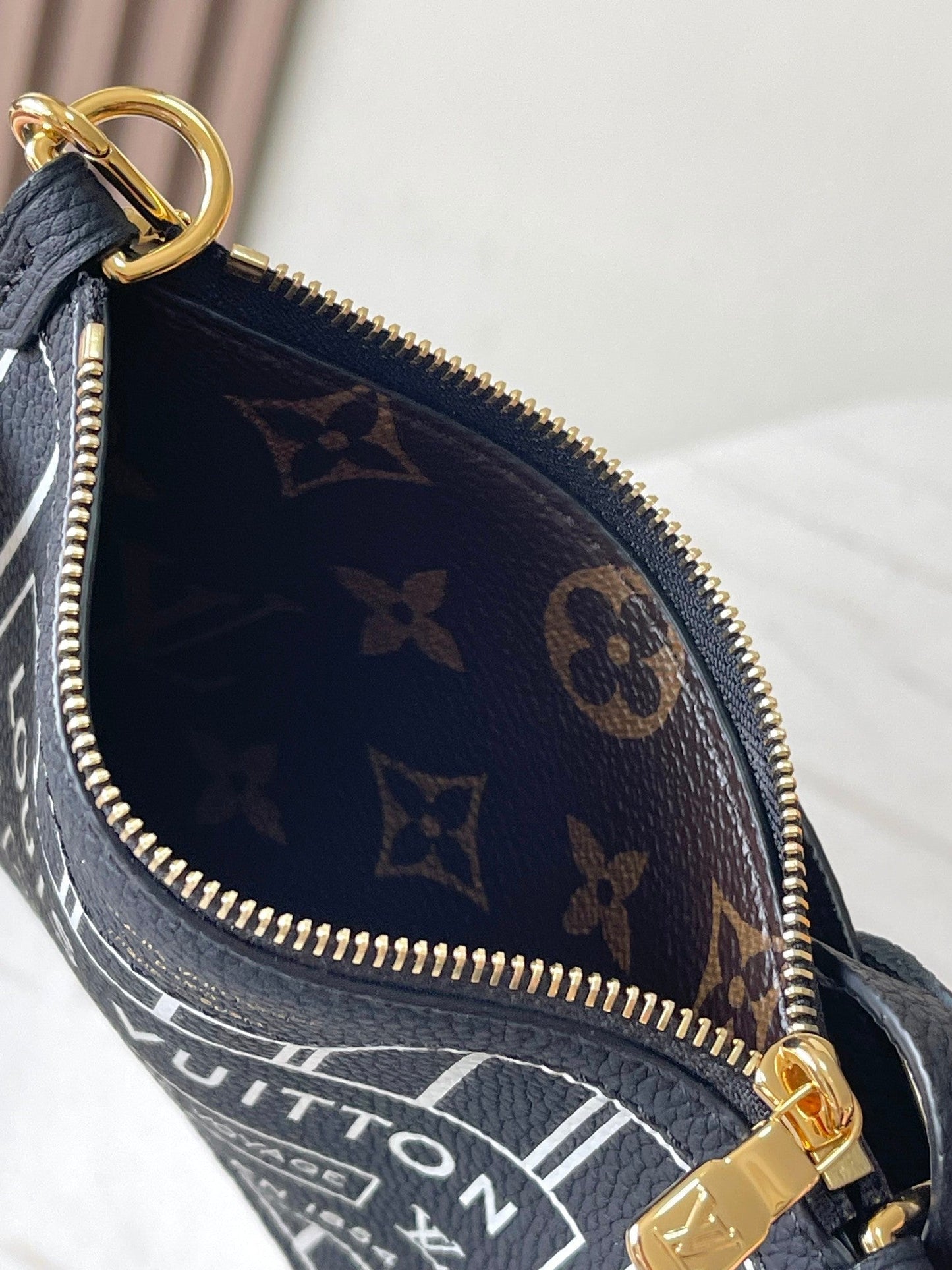 NEVERFULL BANDOULI¨¨RE INSIDE OUT BB 24 IN BROWN MONOGRAM CANVAS AND BLACK CALFSKIN
