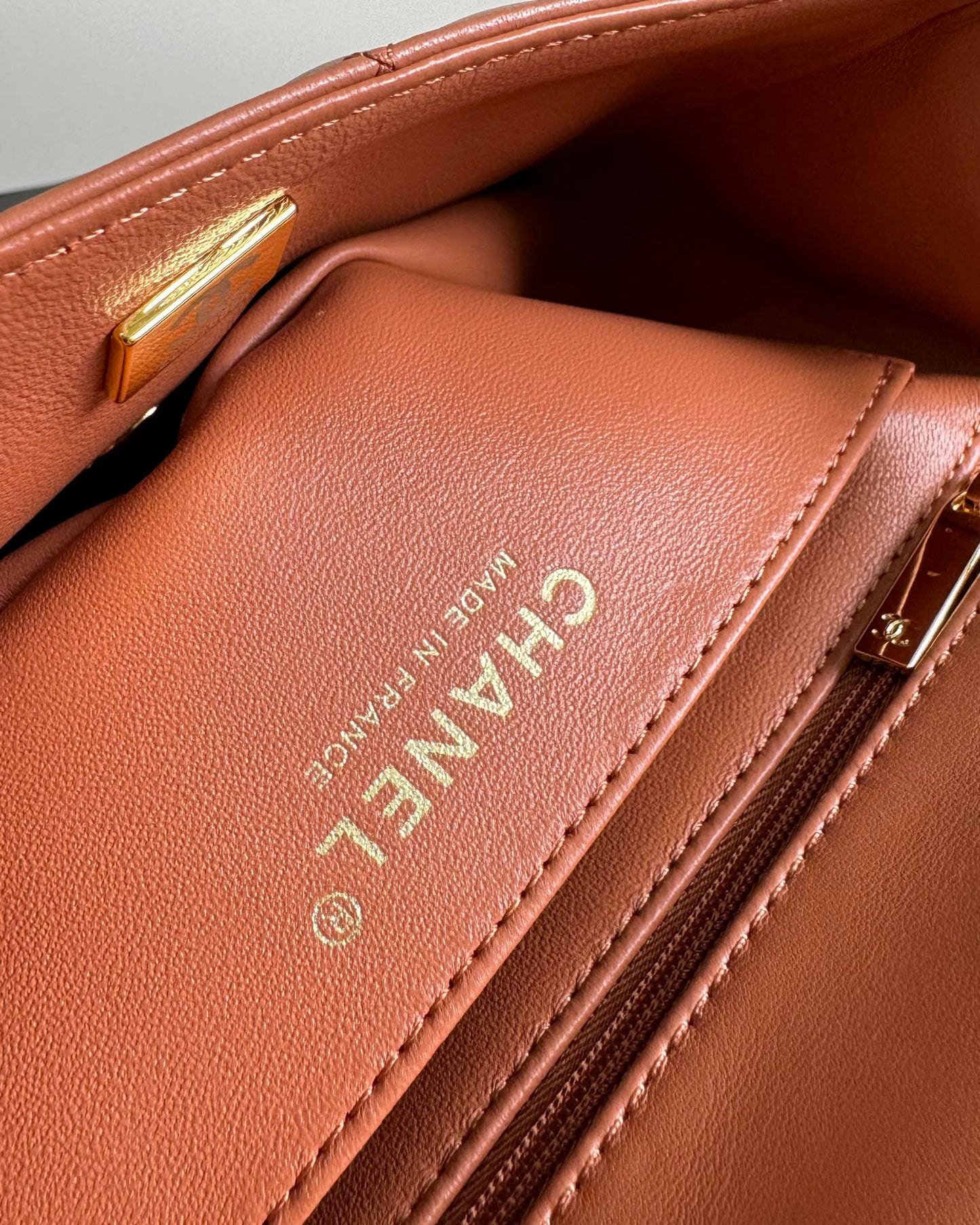 flap bag mini 20 brown lambskin gold hardware