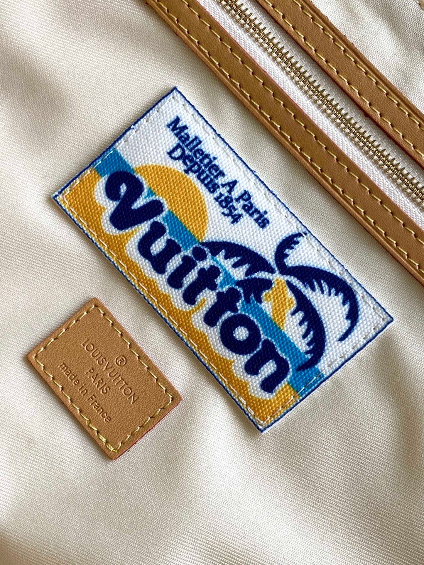 KEEPALL BANDOULI¨¨RE 50 IN SAND TROPICAL MOTIFS MONOGRAM SURFIN CANVAS