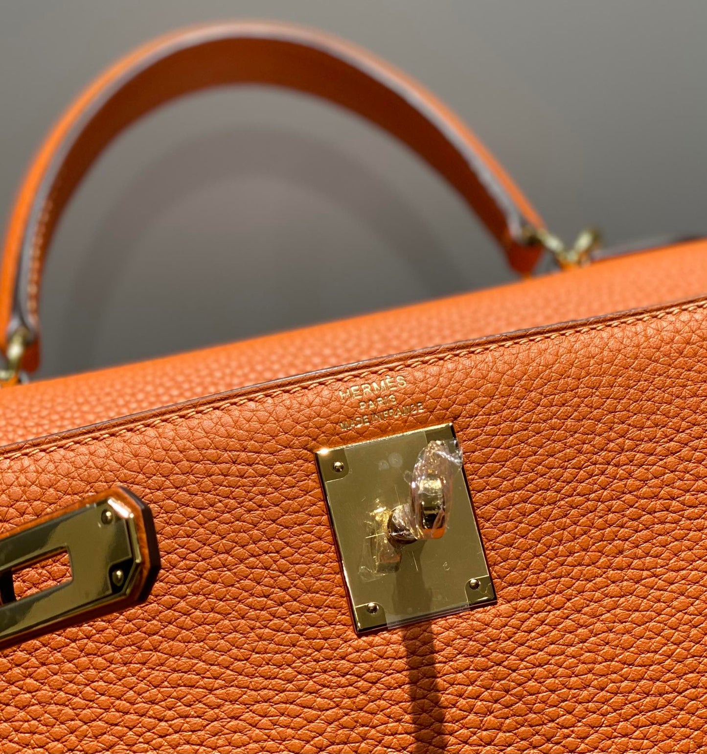 HM KELLY 28CM ORANGE TOGO GOLD HARDWARE