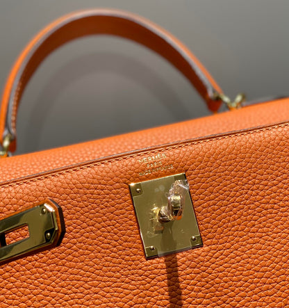 HM KELLY 28CM ORANGE TOGO GOLD HARDWARE
