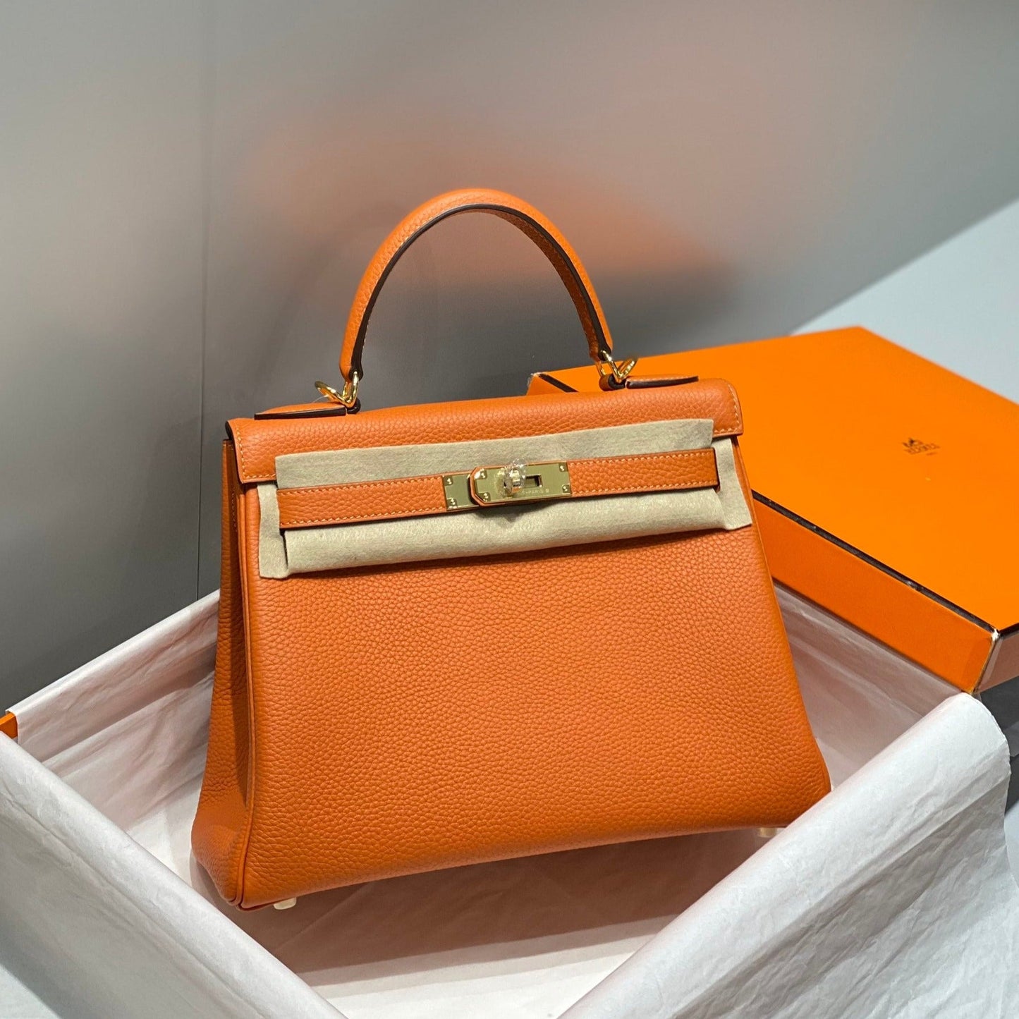 HM KELLY 28CM ORANGE TOGO GOLD HARDWARE