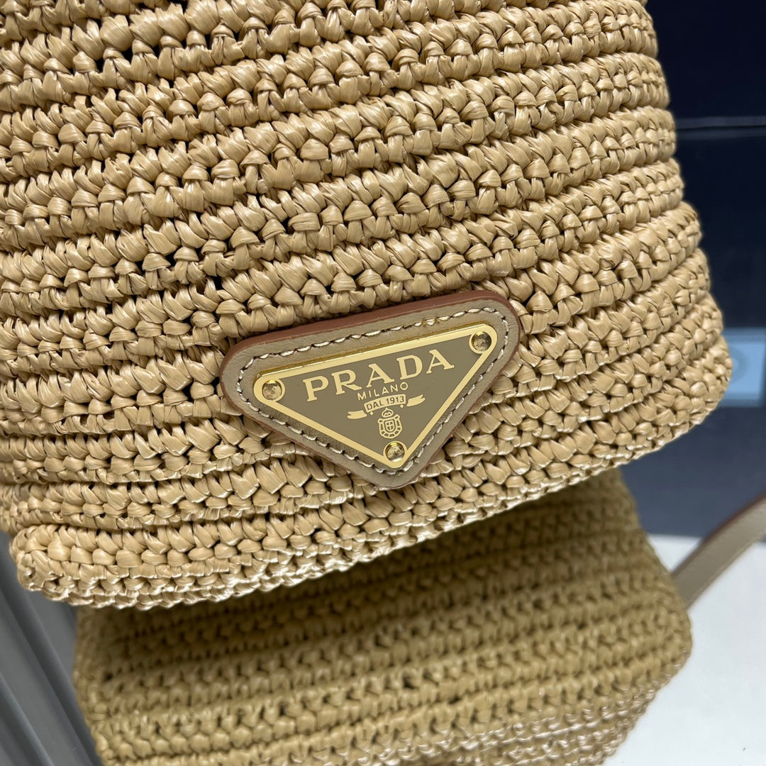 BUCKET BAG 20 IN BEIGE WOVEN RAFFIA EMBOSSED LOGO
