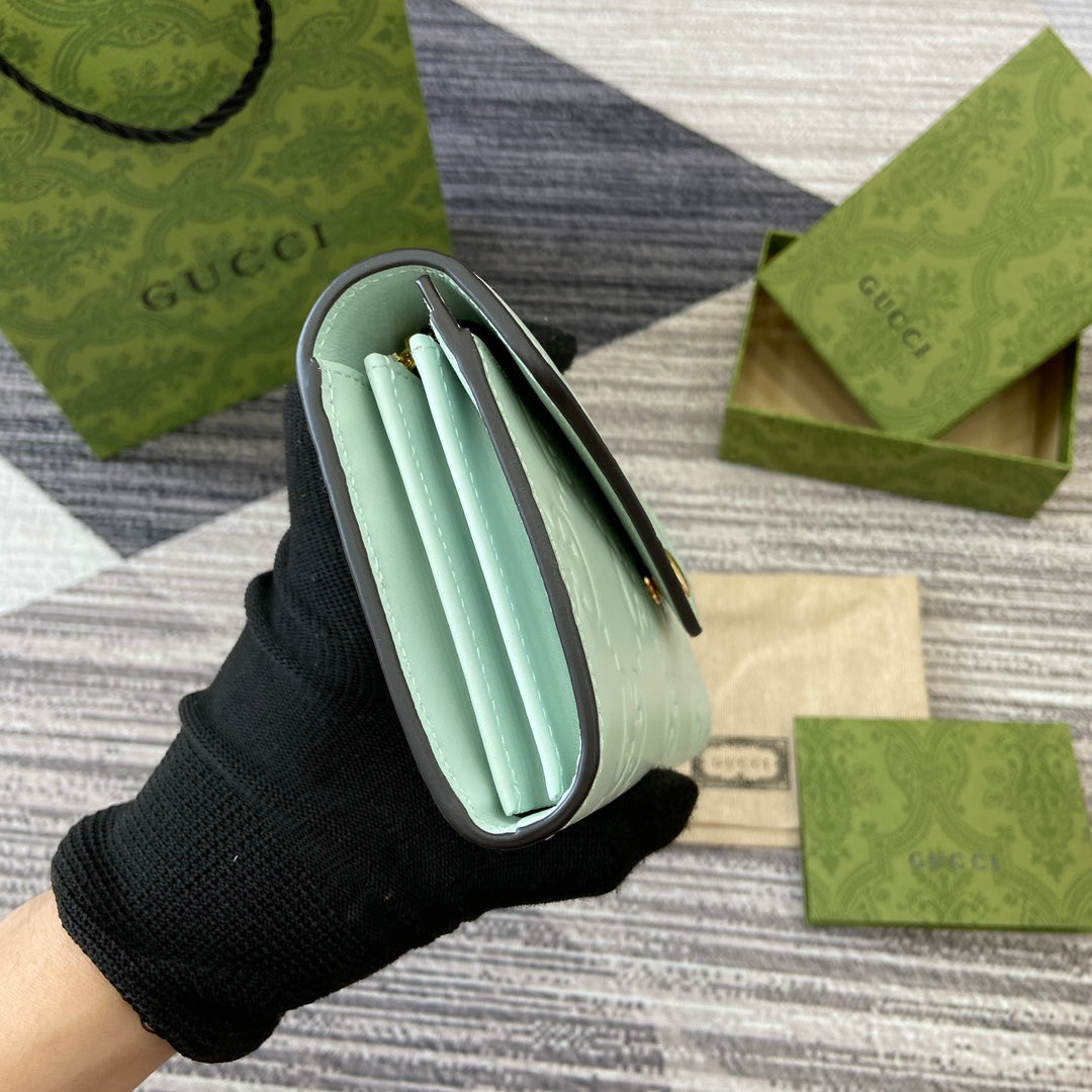 CONTINENTAL WALLET 19 IN MINT GREEN EMBOSSED CALFSKIN GOLD HARDWARE