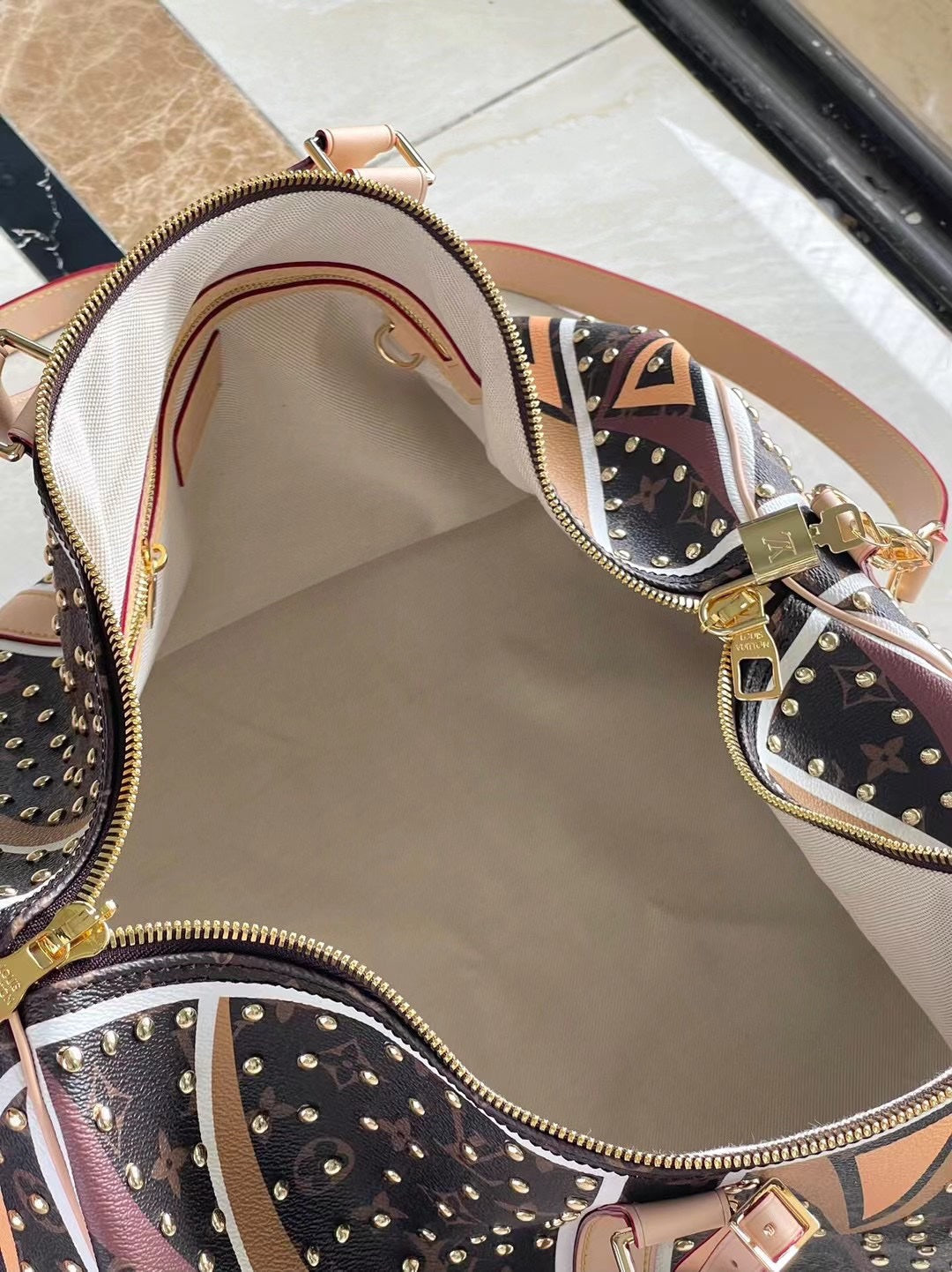 KEEPALL BANDOULI¨¨RE 50 IN PARFLECHE PATTERN MONOGRAM CANVAS