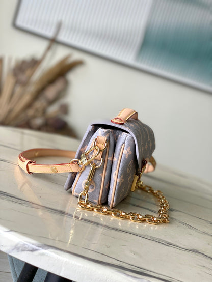 POCHETTE M¨¦TIS EAST WEST 21 IN GRAY CREAM MONOGRAM TRIANON CANVAS GOLD HARDWARE