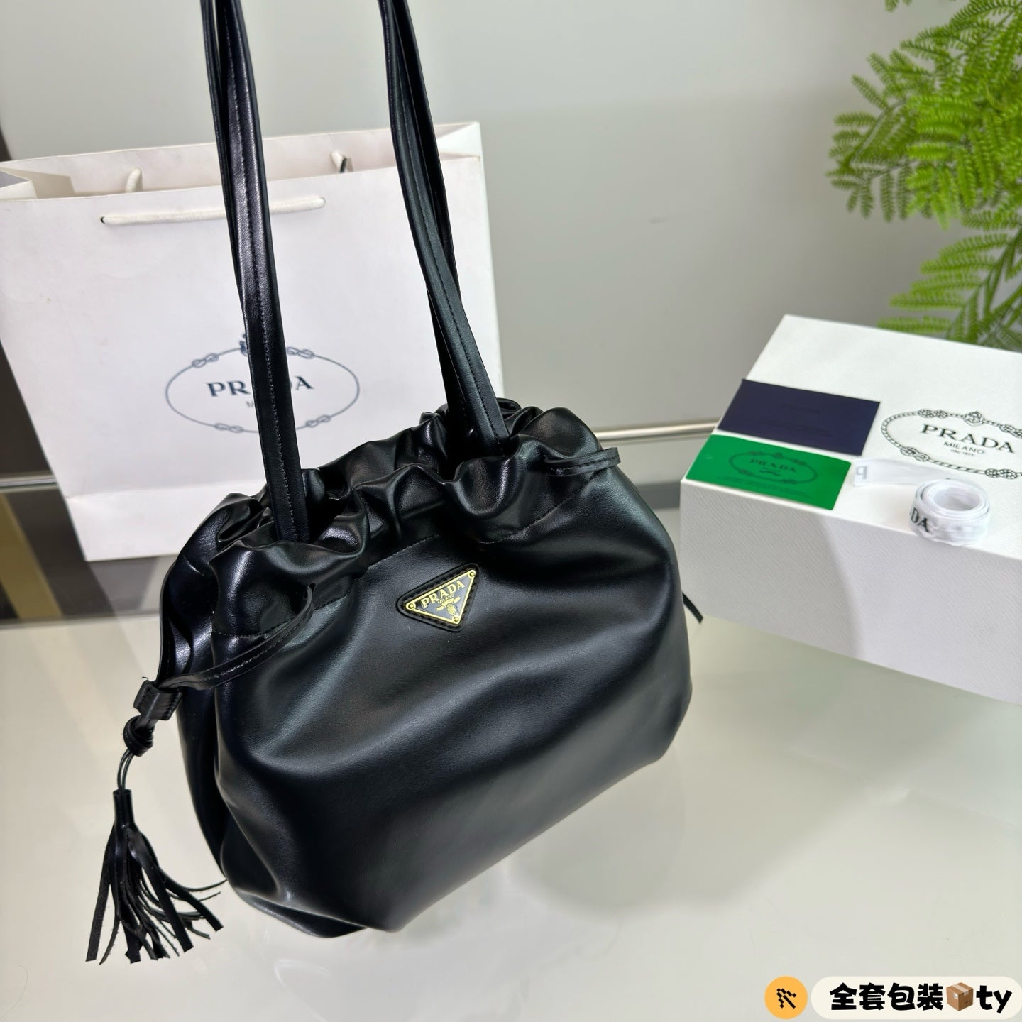 DRAWSTRING BUCKET BAG 25 IN BLACK SOFT LAMBSKIN