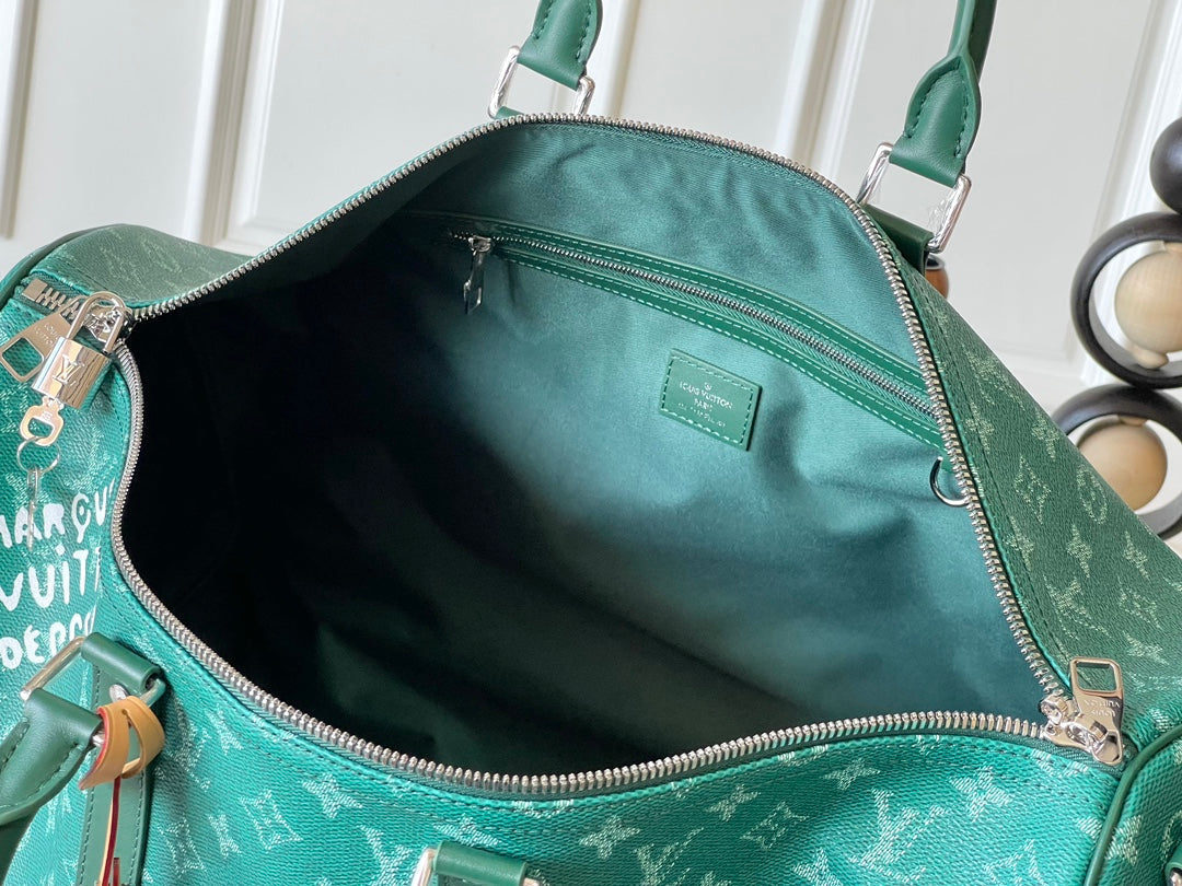 KEEPALL BANDOULI¨¨RE 50 IN GREEN MONOGRAM HERITAGE CANVAS