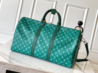 KEEPALL BANDOULI¨¨RE 50 IN GREEN MONOGRAM HERITAGE CANVAS