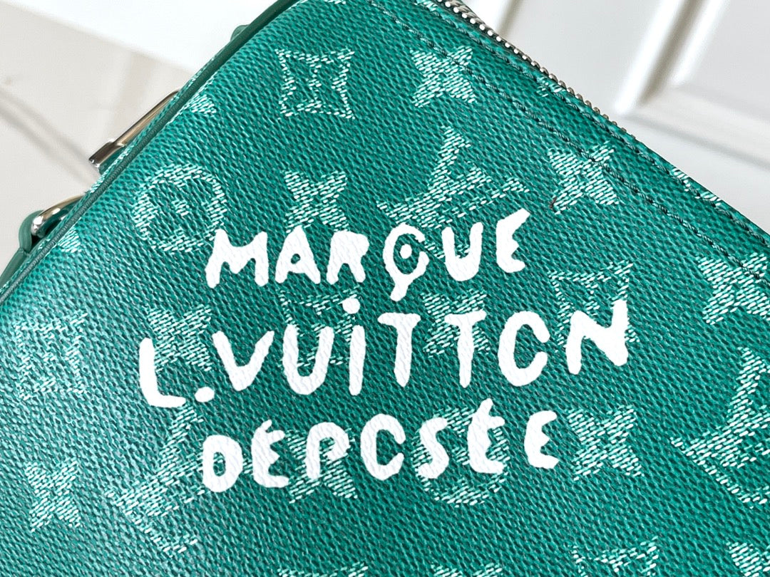 KEEPALL BANDOULI¨¨RE 50 IN GREEN MONOGRAM HERITAGE CANVAS