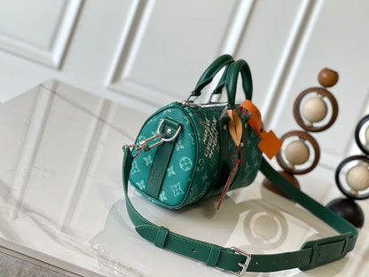 KEEPALL BANDOULI¨¨RE 25 IN GREEN MONOGRAM HERITAGE CANVAS