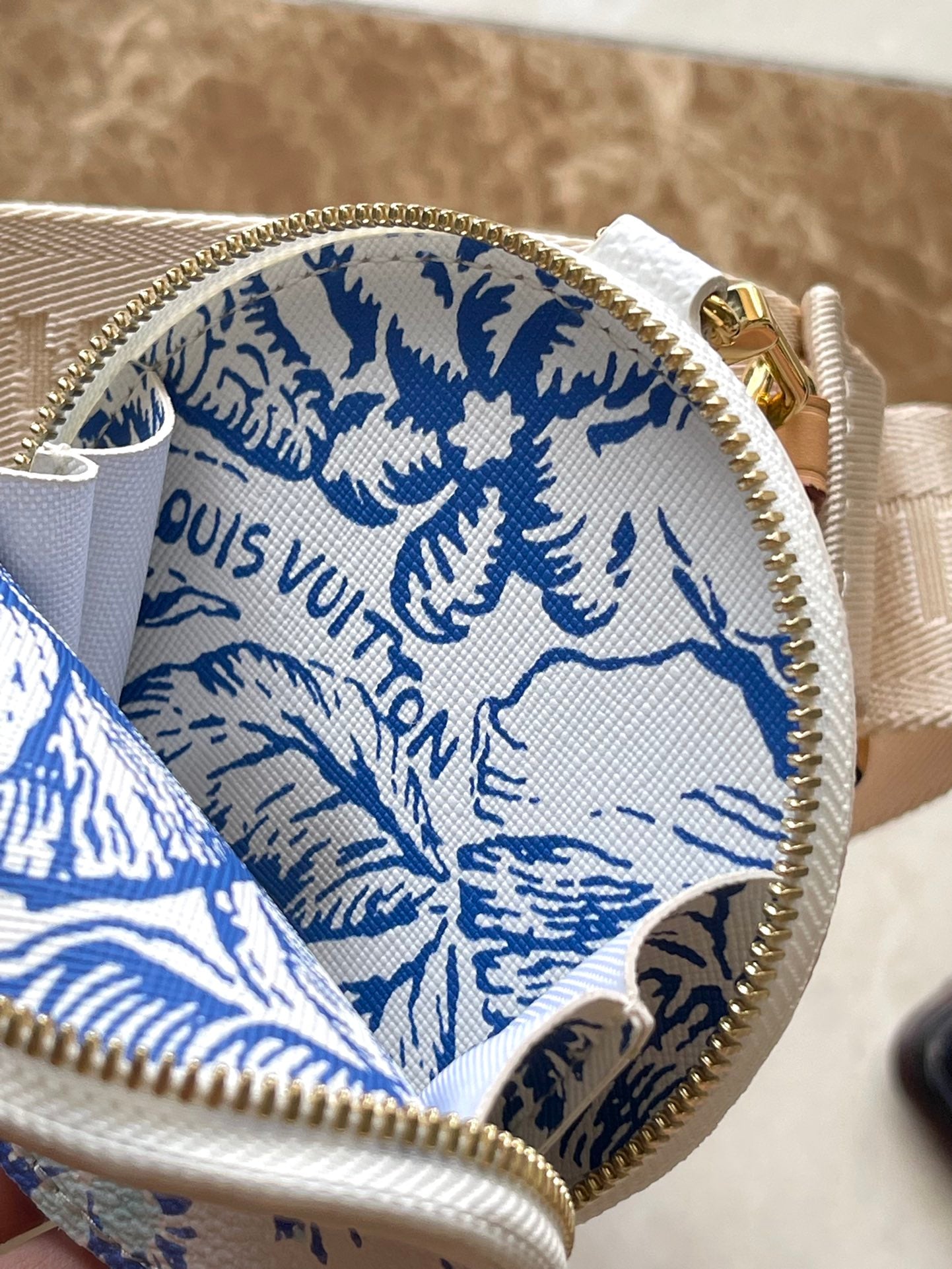 ONTHEGO EAST WEST 25 IN LAGOON BLUE MONOGRAM TILES CANVAS