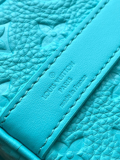 KEEPALL BANDOULI¨¨RE 25 IN TURQUOISE BLUE MONOGRAM EMBOSSED CALFSKIN
