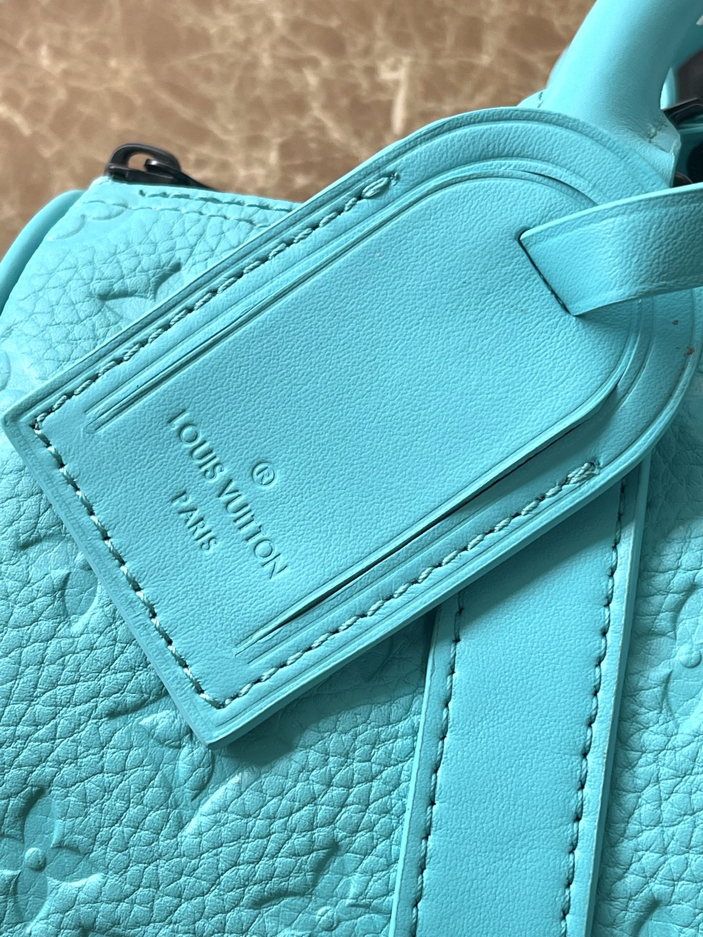 KEEPALL BANDOULI¨¨RE 25 IN TURQUOISE BLUE MONOGRAM EMBOSSED CALFSKIN