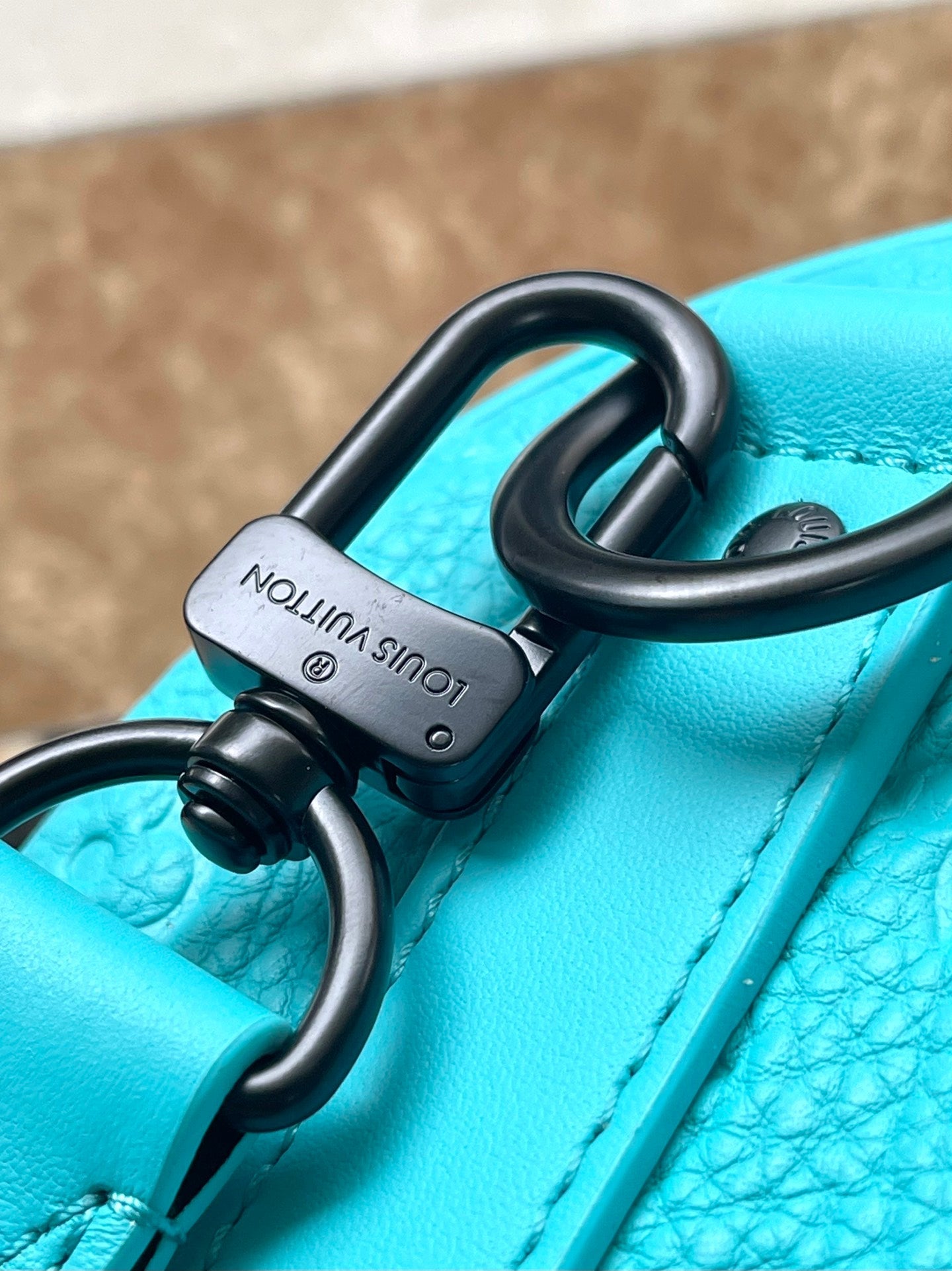 KEEPALL BANDOULI¨¨RE 25 IN TURQUOISE BLUE MONOGRAM EMBOSSED CALFSKIN