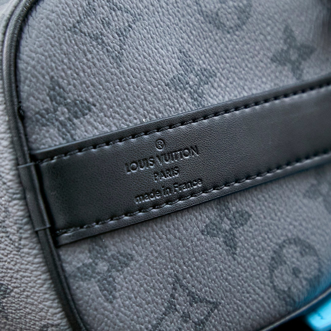 KEEPALL BANDOULI¨¨RE 25 IN GUN METAL MONOGRAM ECLIPSE CANVAS MIX TURQUOISE CALFSKIN