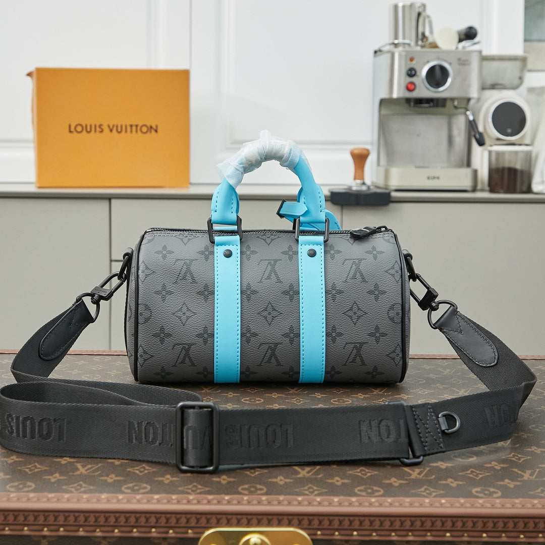KEEPALL BANDOULI¨¨RE 25 IN GUN METAL MONOGRAM ECLIPSE CANVAS MIX TURQUOISE CALFSKIN