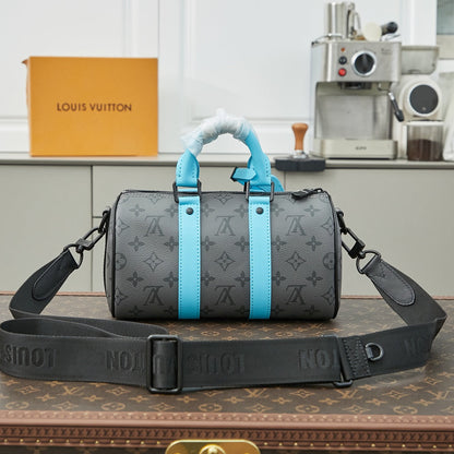 KEEPALL BANDOULI¨¨RE 25 IN GUN METAL MONOGRAM ECLIPSE CANVAS MIX TURQUOISE CALFSKIN