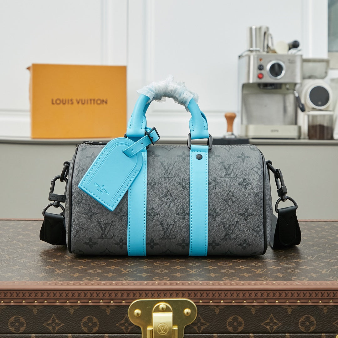 KEEPALL BANDOULI¨¨RE 25 IN GUN METAL MONOGRAM ECLIPSE CANVAS MIX TURQUOISE CALFSKIN