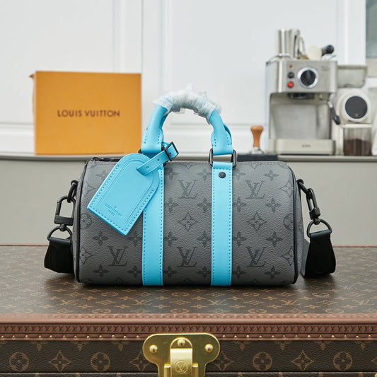 KEEPALL BANDOULI¨¨RE 25 IN GUN METAL MONOGRAM ECLIPSE CANVAS MIX TURQUOISE CALFSKIN