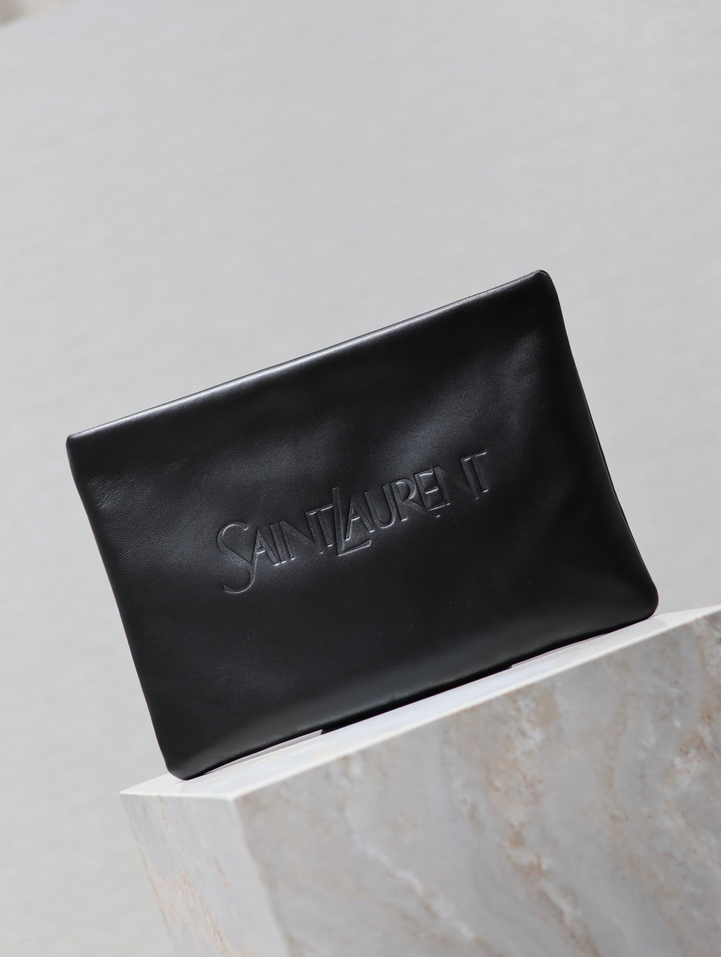 POUCH 30 IN BLACK CALFSKIN WITH EMBOSSED LOGO