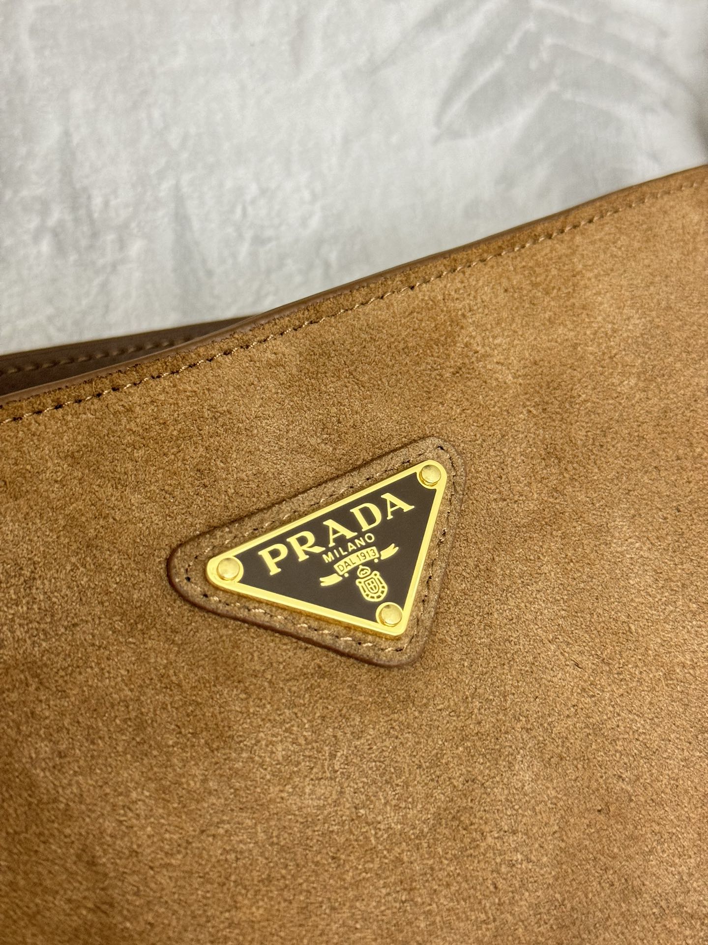 BUCKET BAG 22 IN RUSSET BROWN SOFT SUEDE