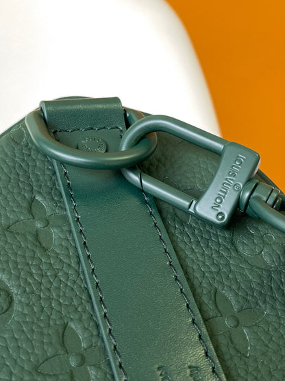 KEEPALL BANDOULI¨¨RE 25 IN FOREST GREEN MONOGRAM EMBOSSED CALFSKIN
