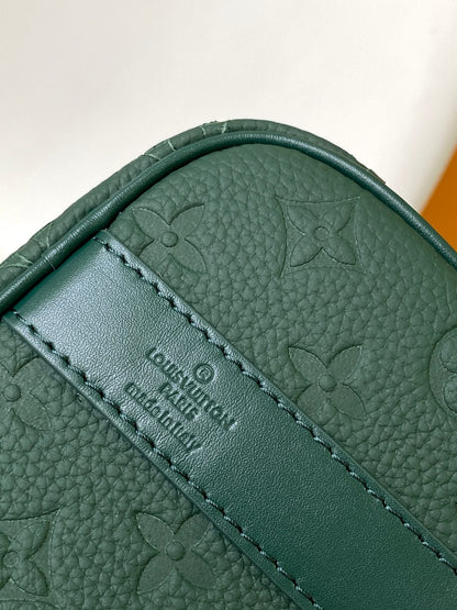 KEEPALL BANDOULI¨¨RE 25 IN FOREST GREEN MONOGRAM EMBOSSED CALFSKIN