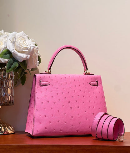 KELLY SELLIER 25 BAG IN DOLL PINK OSTRICH LEATHER WITH GOLD HARDWARE (MADE - TO - ODER)