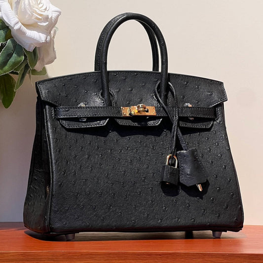 KELLY SELLIER 25 BAG IN BLACK OSTRICH LEATHER WITH GOLD HARDWARE (MADE - TO - ODER)