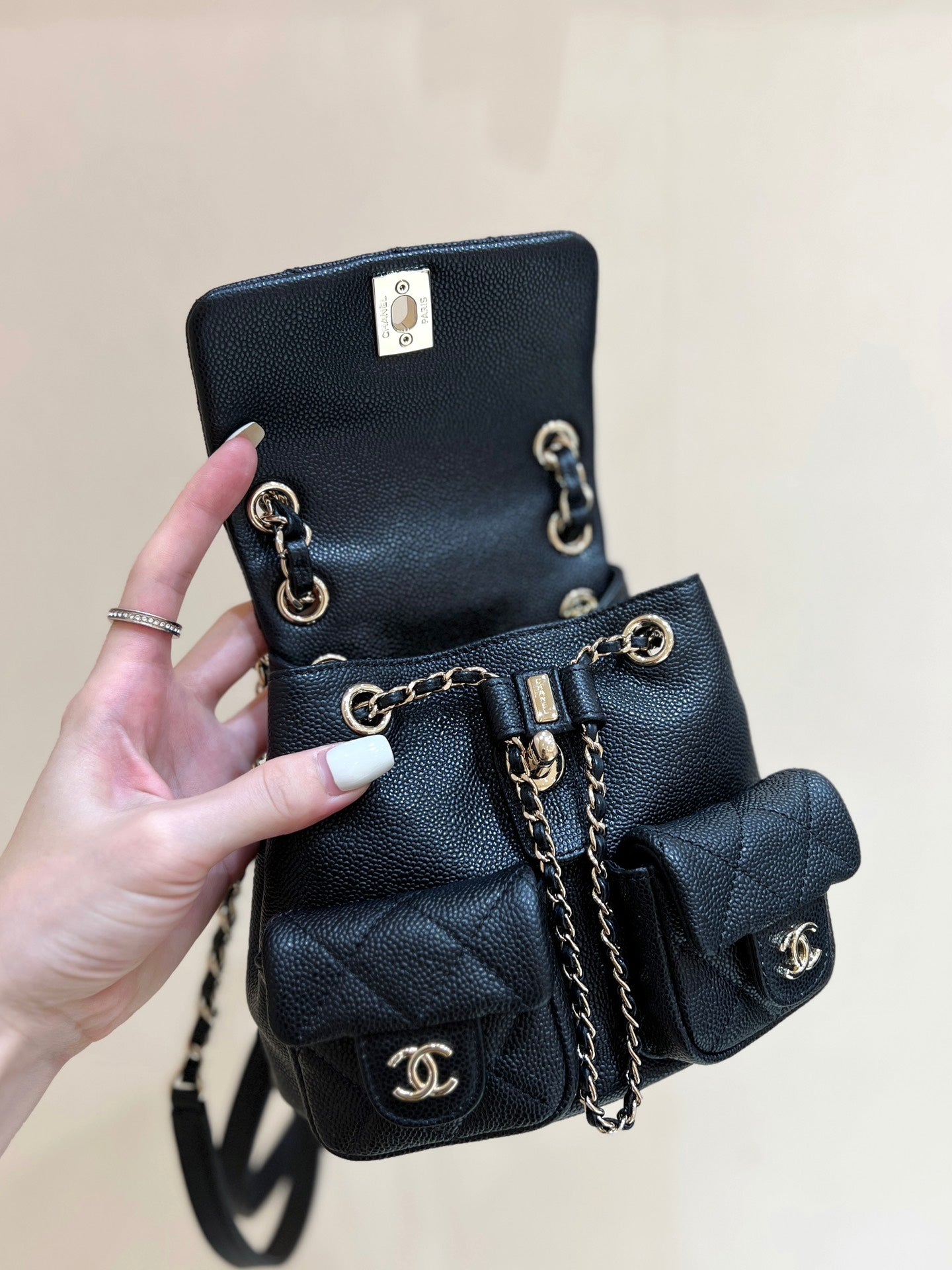 24a duma backpack black caviar leather light gold hardware