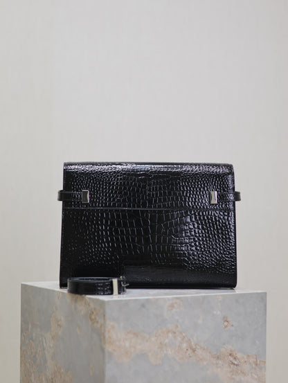 MANHATTAN MEDIUM 29 IN BLACK CROCODILE-EMBOSSED CALFSKIN SILVER BUCKLE