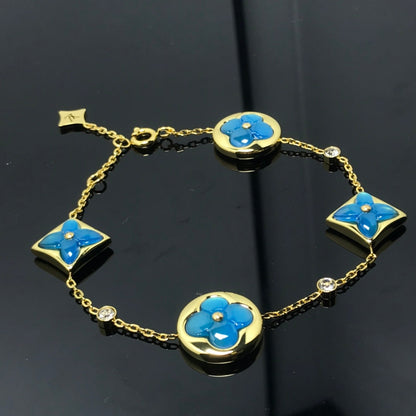 DIANA STAR AND SUN 4 MOTIF BLUE BRACELET