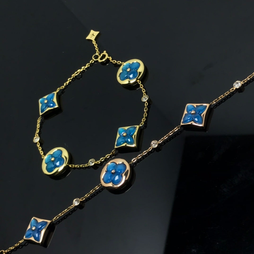 DIANA STAR AND SUN 4 MOTIF BLUE BRACELET